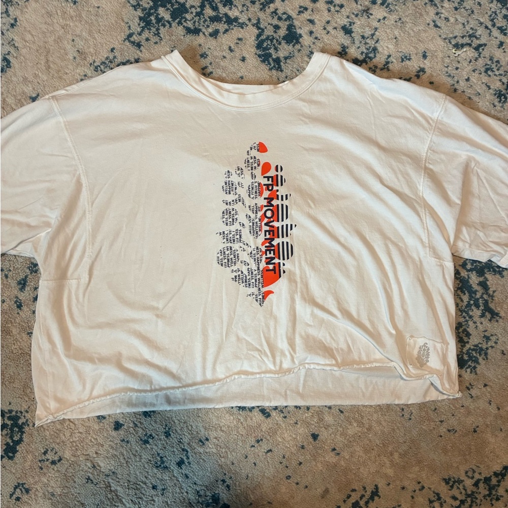 Free people movement logo graphic tee